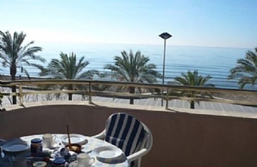 Calafell Apartment | Spacious seafront apartment overlooking the the beach with WIFI, parking & lift
