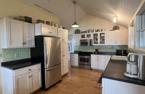 Harpswell House | Spacious single-story cottage with ocean views, large screen porch, and a quiet location.