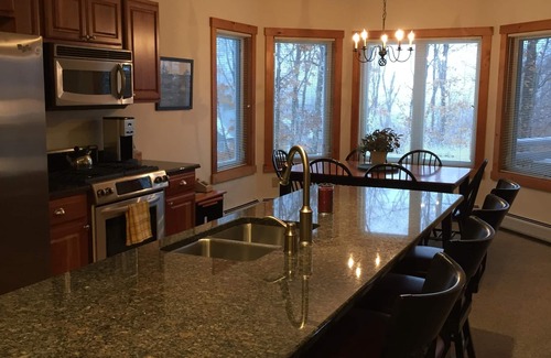 North Troy Condo | Spacious ski-in, ski-out 2-BR Jay Peak Village Condo, right on trail. A/C incl.!