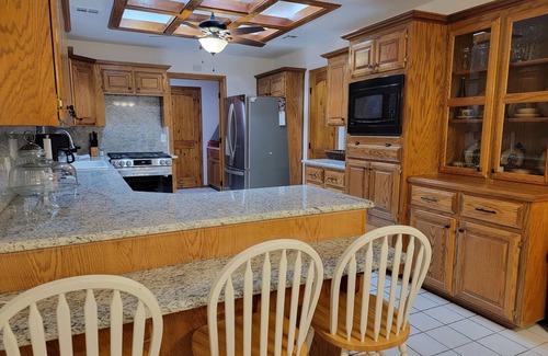 Frederick House | Spacious small town retreat with inground pool and privacy fence.