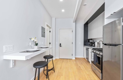 Central Park South Apartment | Spacious Studio with Charming Juliet Balcony