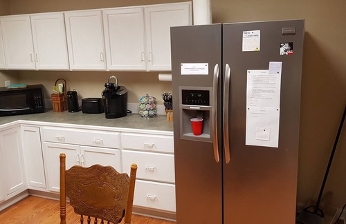 Athens House | Spacious suite with fenced back yard, deck, gas grill, fireplaces and splash pad