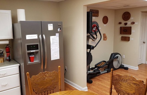 Athens House | Spacious suite with fenced back yard, deck, gas grill, fireplaces and splash pad