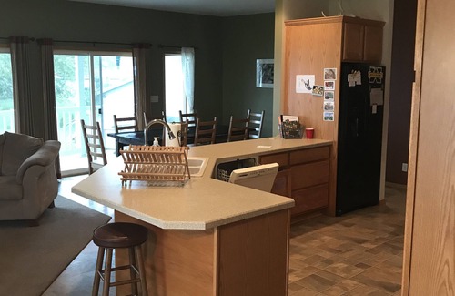 Brooklyn House | Spacious Vineyard Lake Lakefront Cottage within 5 minutes of MIS