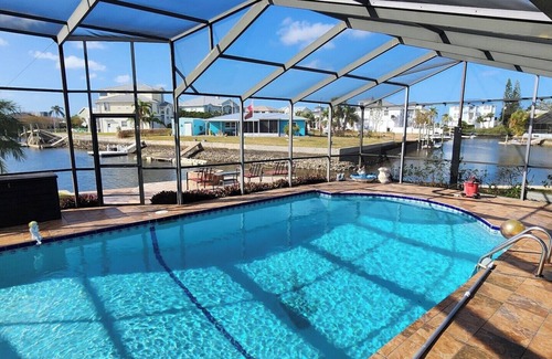 Spring Hill House | Spacious Waterfront with heated swimming pool. 5-bedroom home in Hernando Beach