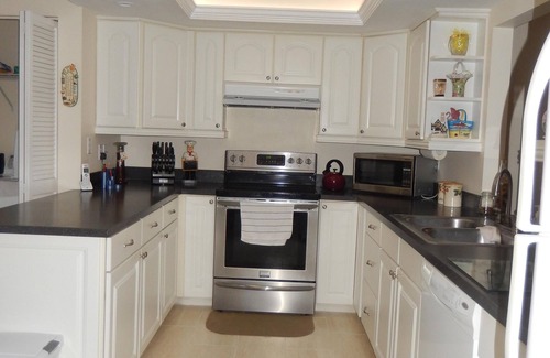 Sarasota Condo | Spacious Well Appointed Property, view across pond within a lovely community