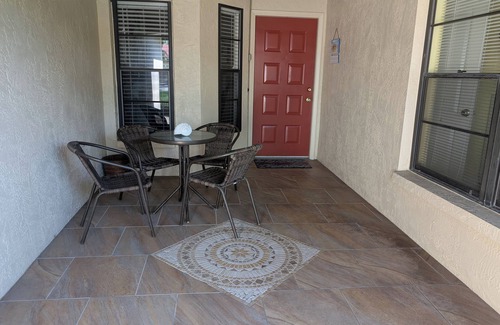 Sarasota Condo | Spacious Well Appointed Property, view across pond within a lovely community