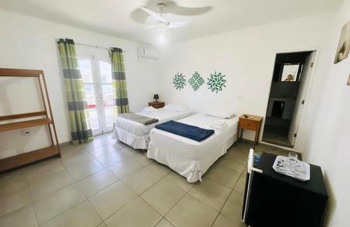 Itauna House | Spazio Itaúna Pousada