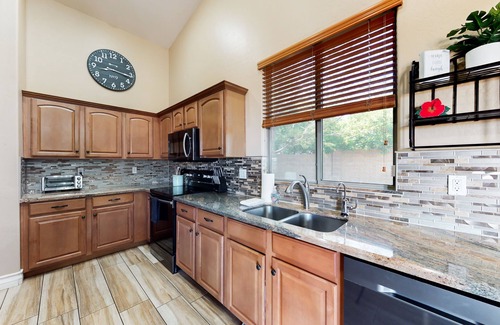 Surprise Farms House | Spectacular oasis with private pool, large yard, & game room