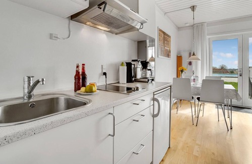 Akirkeby Apartment | Spend a relaxing vacation in this cozy apartment with shared pool.