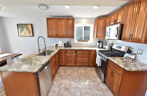 Suttons Bay House | Spend Summer on Beautiful West Bay!