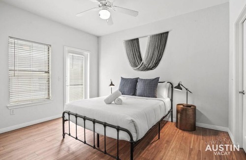 West Campus Apartment | Spiral Stairs to Loft Bedroom Balcony with Shade