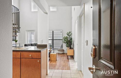West Campus Apartment | Spiral Stairs to Loft Bedroom Balcony with Shade