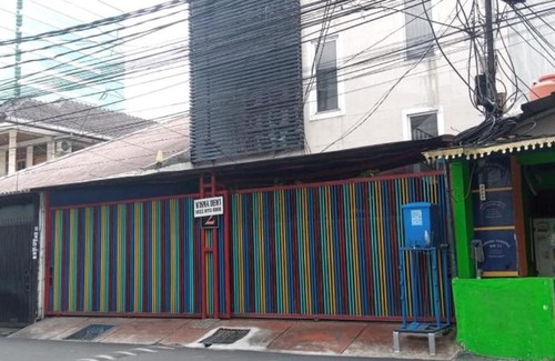 Palmerah Hotel | SPOT ON 90538 Wisma Dewi Syariah