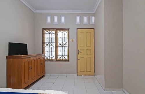 Pekanbaru Hotel | SPOT ON 91958 Flamboyan 25 Homestay Syariah