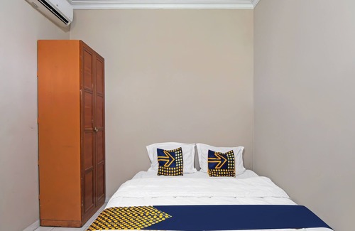 Pekanbaru Hotel | SPOT ON 91958 Flamboyan 25 Homestay Syariah