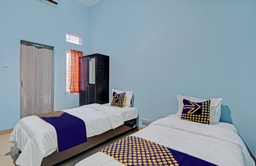 Pekanbaru Hotel | SPOT ON 92801 Penginapan Puti SyariahNearBandara Sultan Syarif Kasim II