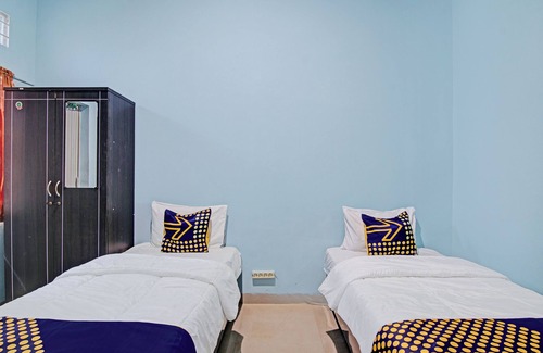Pekanbaru Hotel | SPOT ON 92801 Penginapan Puti SyariahNearBandara Sultan Syarif Kasim II