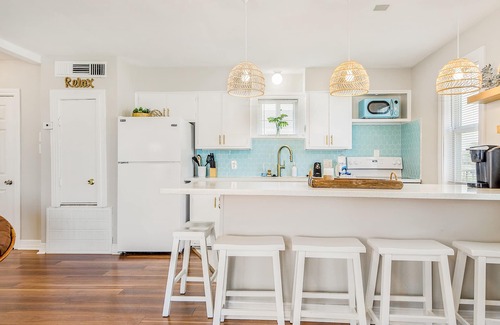 Galveston House | Sprawling island retreat with pool & tennis access - covered patio & grill