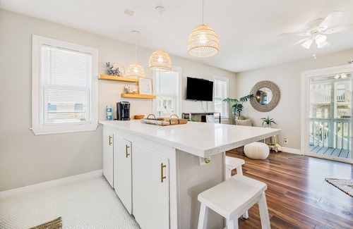 Galveston House | Sprawling island retreat with pool & tennis access - covered patio & grill