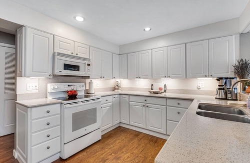 Olympia House | Sprawling lakefront property with kayaks, large deck, game table, & fireplace