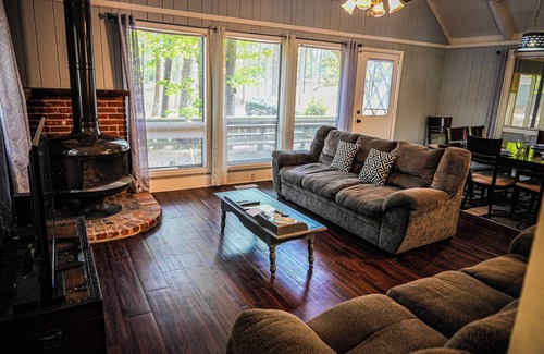 Pine Mountain Ski Chalet | Spread out and relax in this spacious wooded view chalet close to FDR State Park
