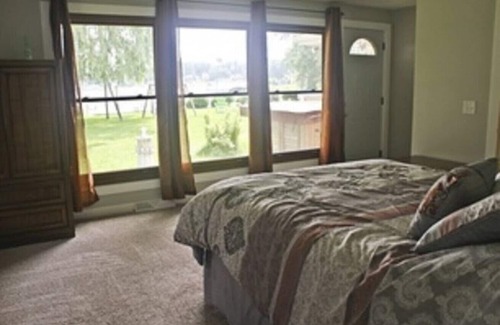 Spring Lake House | Spring lake cove · Waterfront with hot tub and dock Spring Lake Cove