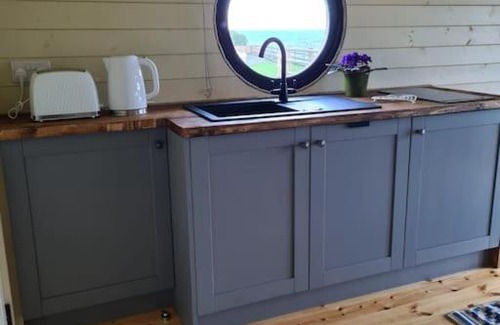Isle of Thanet Ski Chalet | Spring Tide Cliff Top Glamping Pod with direct Sea Views