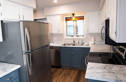 Cody House | Stampede Place- New listing! Dog friendly home close to grocery stores and library