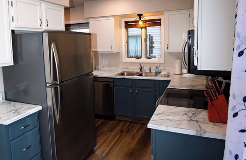 Cody House | Stampede Place- New listing! Dog friendly home close to grocery stores and library