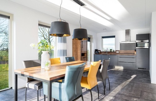 Akkrum House | Stay in our spacious Sneekermeer 6 home with private jetty.