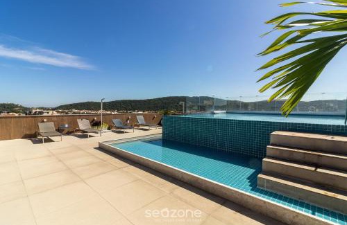 Passagem Apartment | Stay with pool and sauna just steps from the beach in Cabo Frio - HSC