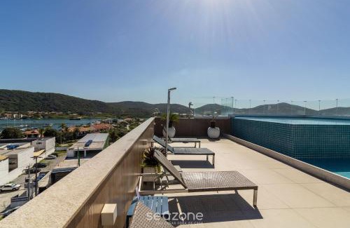Passagem Apartment | Stay with pool and sauna just steps from the beach in Cabo Frio - HSC