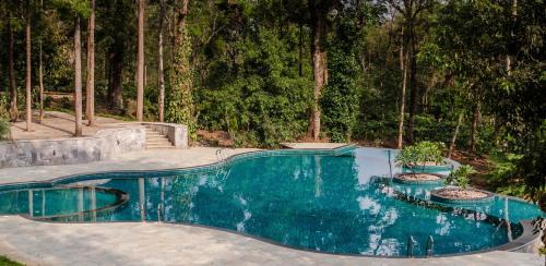 Somvarpet Villa | StayVista at Acacia Villa One - Free Breakfast, Pool, Gym & Indoor Games