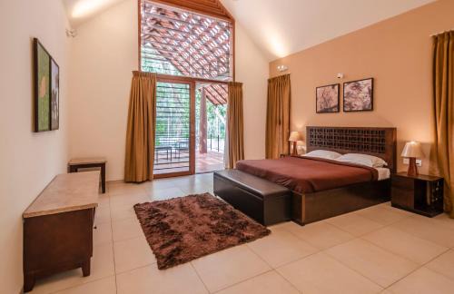 Somvarpet Villa | StayVista at Acacia Villa One - Free Breakfast, Pool, Gym & Indoor Games