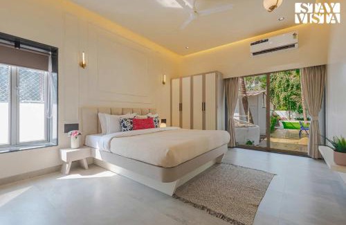 Nagaon Villa | StayVista at Serenity Shores with Pool, Bonfire, Lawn