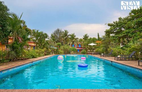 Varca Villa | StayVista at Tarika's Santorini Hideaway - Shared Pool, BBQ & Board Games