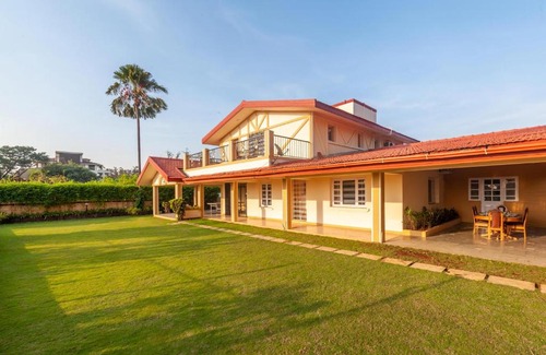 Kune Village Villa | StayVista's V Square - Enjoy a pool and indoor games for a leisurely stay
