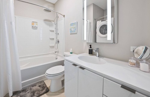 Crossroads Arts District Condo | Step into a World of Comfort and Entertainment w/ our Amazing Movie Theatre 352