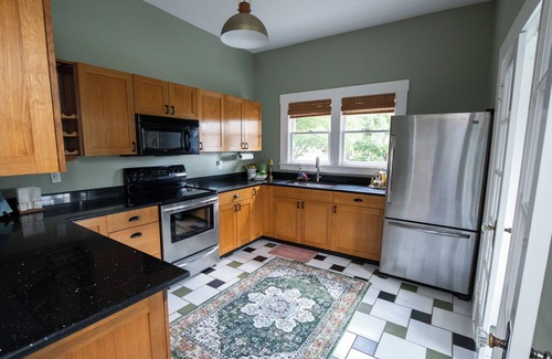 Seminole Heights House | Step into Tampa charm at this sun-drenched 1913 bungalow in Seminole Heights! Walk to top-rated cafes, breweries, and bakeries, then unwind in a beautifully renovated space filled with character, comfort, and local flair. Historic soul, modern style.