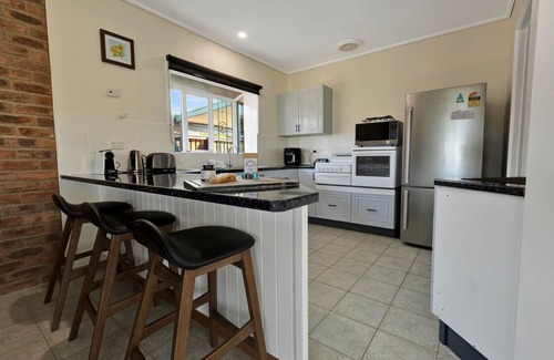 Paynesville House | Step onto the spacious deck and drink in the mesmerizing views of the water