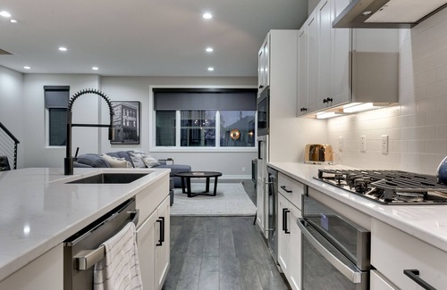 Dahlman House | Steps from Downtown Omaha! Rooftop firepit & luxury accommodations