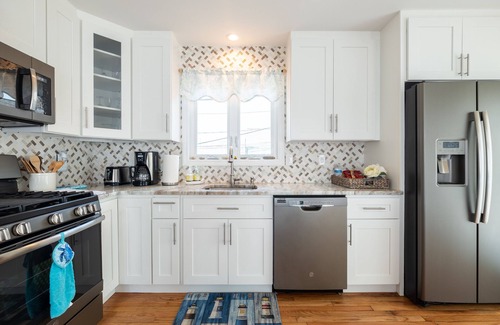 Fairfield House | Steps from the beach with water views!