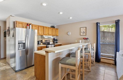 Osage Beach Condo | Steps from the pool! Sunset view for miles- lakefront pool