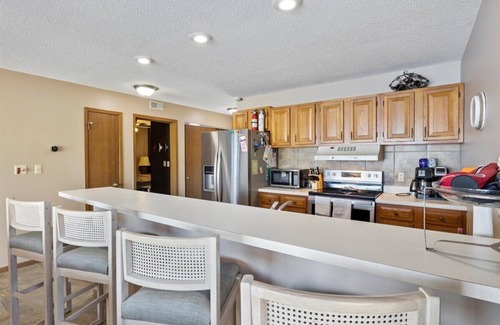 Osage Beach Condo | Steps from the pool! Sunset view for miles- lakefront pool