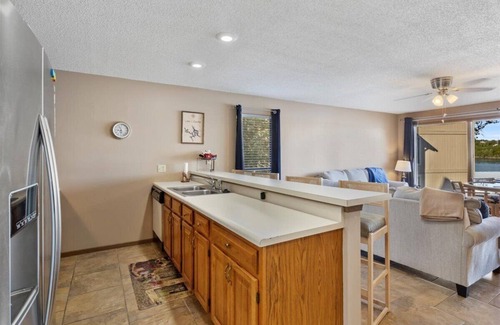 Osage Beach Condo | Steps from the pool! Sunset view for miles- lakefront pool