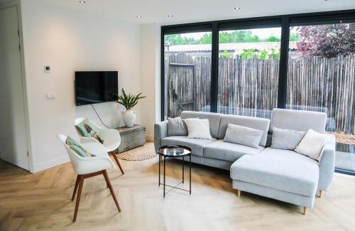 Baarland House | Stijlvol ingerichte (4 pers.) bungalow in Baarland