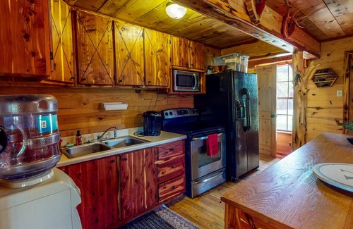 Stringtown Cabin | Stone cabin with a pond & water access - firepit, dog-friendly