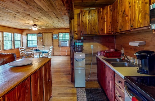 Stringtown Cabin | Stone cabin with a pond & water access - firepit, dog-friendly