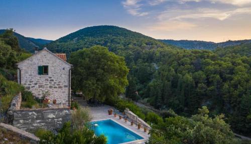 Dol House | Stone Dalmatian House Modern, Stylish with Pool